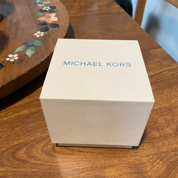 Like new Michael Kors rose gold watch with box and care instructions included. - Picture 6 of 14